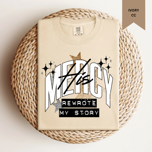 His Mercy Rewrote My Story Trendy Tee.